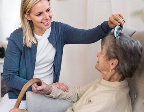 caregiver-combing-hair